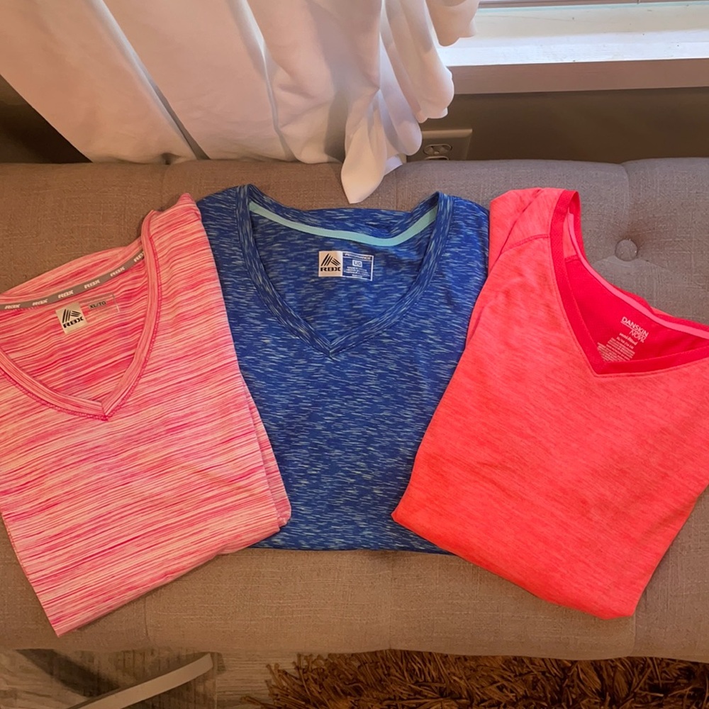 Three athletic shirts